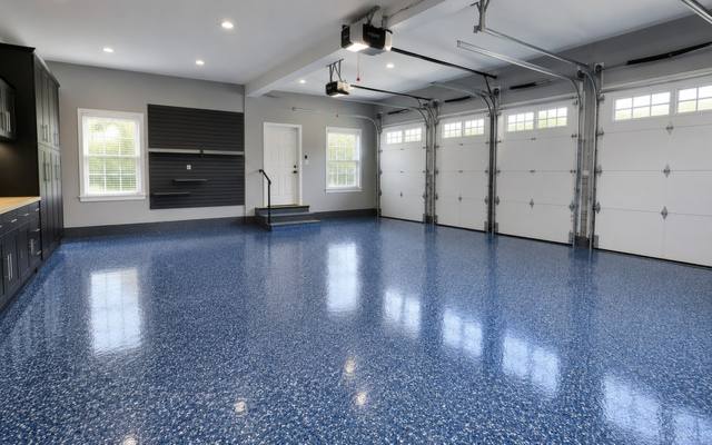 Blue flake epoxy floor in a double garage in Sherwood Park